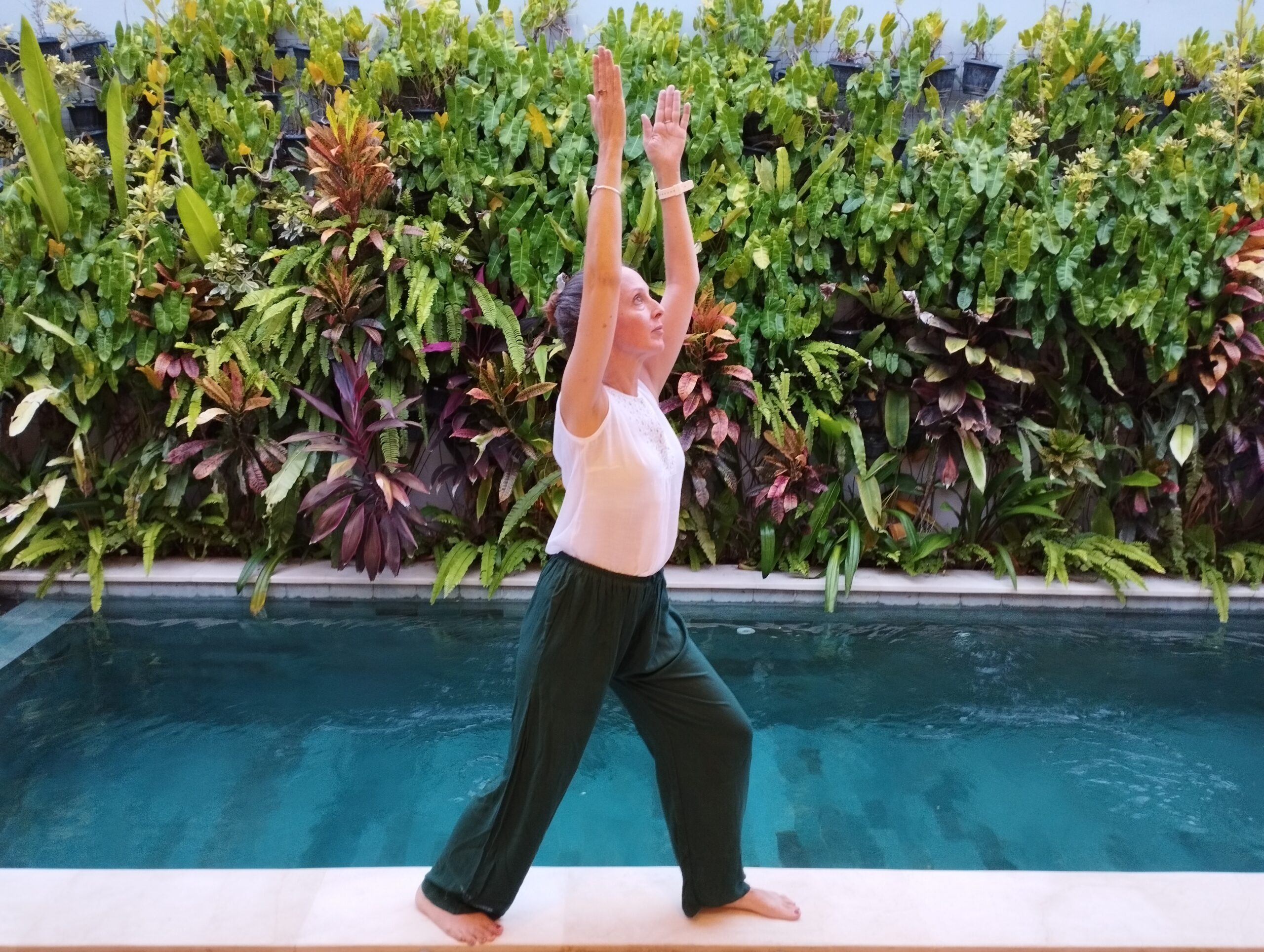 Natasha does yoga in her retreat